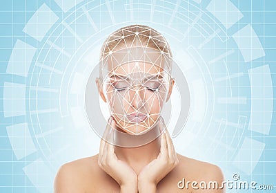 Portrait of attractive woman with a scnanning grid on her face. Face id, security, facial recognition, future technology Stock Photo