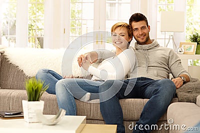 Portrait of attractive young couple at home Stock Photo