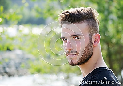 Portrait of attractive young man outdoors Stock Photo