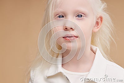 Awesome albino kid with blonde hair, isolated Stock Photo