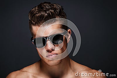 Portrait of awesome male in sun glases. Stock Photo