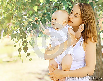 Portrait baby and mother walking Stock Photo