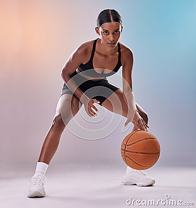 Portrait, basketball player or black woman isolated on gradient background in action, challenge and body workout. Indian Stock Photo