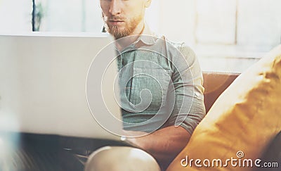 Portrait Bearded Businessman work Laptop modern Design Interior Loft Studio Place.Man relaxing Vintage Sofa.Use Stock Photo