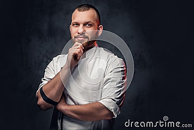 Portrait of bearded chef cook. Stock Photo