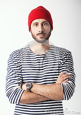 Portrait of bearded guy in sailor striped shirt Stock Photo