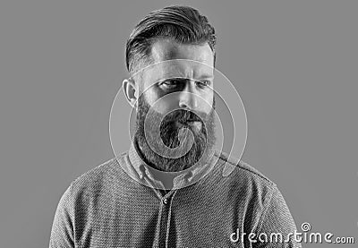 Portrait of bearded man. Irish man with unshaven face. Serious man with red beard studio Stock Photo