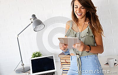 Portrait of beaufitul woman working with tablet. Technology, business, study people concept Stock Photo