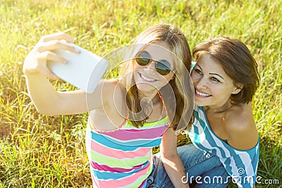 Portrait of beautiful adult mother and her daughter teenage girl Stock Photo