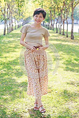 Portrait of beautiful asian young woman with smiling face standi Stock Photo