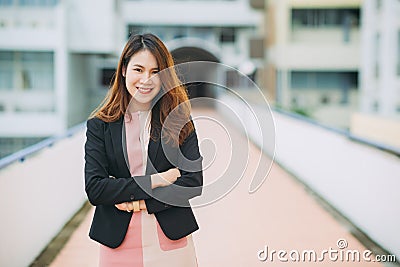 Portrait of a beautiful authentic satisfied business woman looking at camera. Concept for leadership and successful startup millen Stock Photo