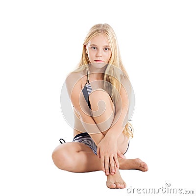 Portrait of a beautiful blonde European girl wearing swimming suit. Stock Photo