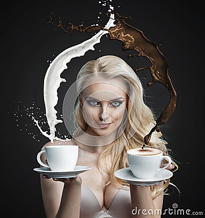 Portrait of a beautiful blonde holding making a coffee hurricane Stock Photo