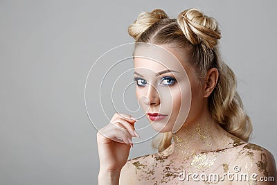 Portrait of beautiful blonde woman with makeup beauty photoshoot on background Stock Photo