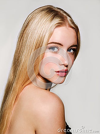 Portrait of beautiful blonde young woman face. Spa model girl with fresh clean skin isolated on a white background Stock Photo