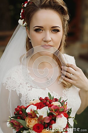 Portrait of beautiful bride with bouquet, gorgeous blonde bride Stock Photo