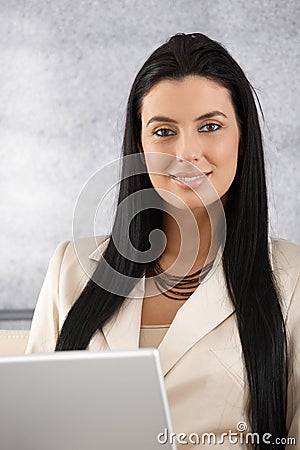 Portrait of beautiful businesswoman smiling Stock Photo