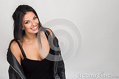 Portrait of a beautiful cheerful young woman. Photo indoors Stock Photo