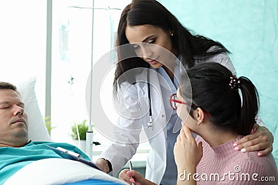 Tired patient resting in hospital ward Stock Photo