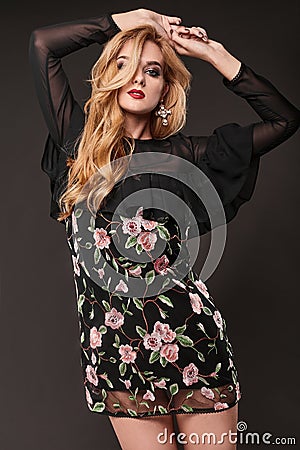 Portrait of beautiful elegant woman in fashionable dress Stock Photo
