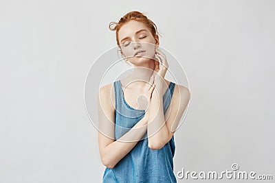 Portrait of beautiful foxy model posing with closed eyes. Stock Photo