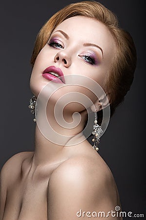 Portrait of a beautiful ginger woman in the image of the bride. Stock Photo