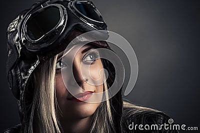 Portrait of a beautiful girl in aviator helmet Stock Photo