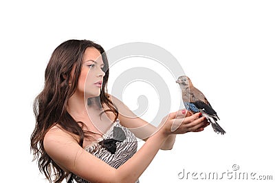 Portrait of beautiful girl with bird on the hand Stock Photo