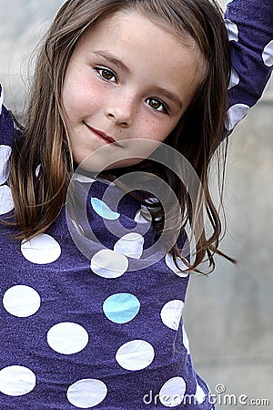 Cute little girl with brown eyes Stock Photo