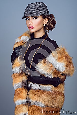 Portrait of a beautiful glam model in fox jacket Stock Photo