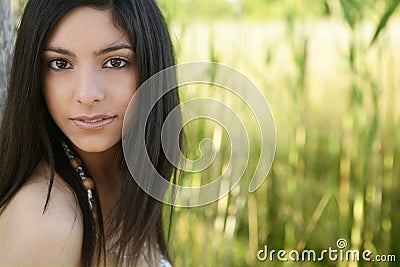 Portrait of beautiful indian woman on nature Stock Photo