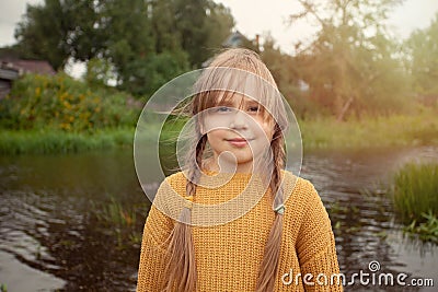 Portrait of a beautiful liitle girl close-up Stock Photo