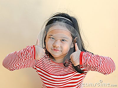 Portrait of a beautiful liitle girl close-up Stock Photo