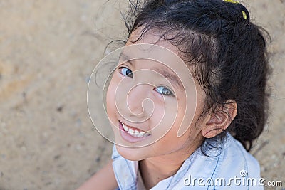 Portrait of a beautiful liitle girl close-up Stock Photo