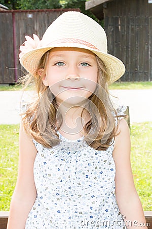 Portrait of a beautiful liitle girl with hat Stock Photo