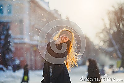 Portrait beautiful redhair girl in frosty winter weather. Stock Photo