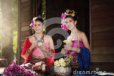 Portrait of Beautiful rural thai woman wear thai dress in Chiang Mai, Thailand Stock Photo