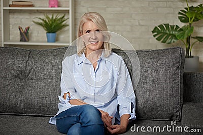 Portrait of beautiful senior woman with white hair is smiling Stock Photo