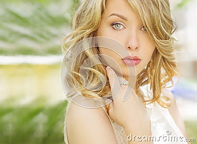 Portrait of a beautiful girl with large plump lips with white hair and a white full long finger Stock Photo