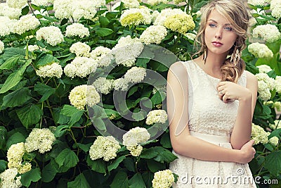 Portrait of a beautiful girl with large plump lips with white hair and a white full long finger Stock Photo