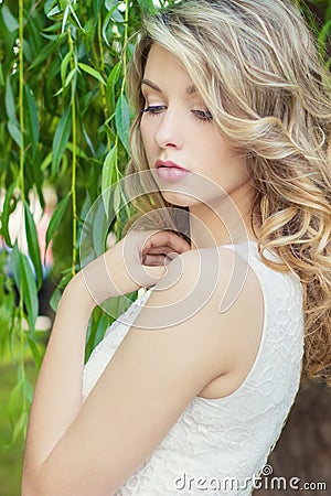 Portrait of a beautiful girl with large plump lips with white hair and a white full long finger Stock Photo