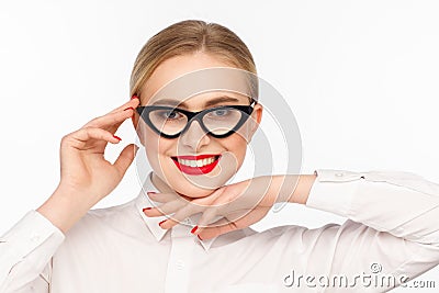 Portrait of a beautiful smiling businesswoman with glasses and a white shirt Stock Photo