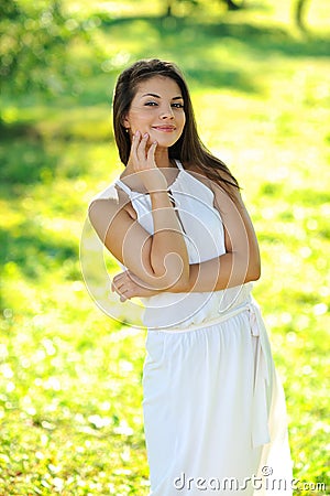 Portrait of beautiful smiling girl on a meadow Stock Photo