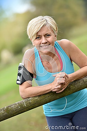 Portrait of beautiful smiling senior woman outdoors Stock Photo