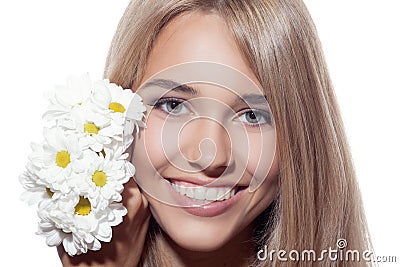 Portrait Of Beautiful Smiling Woman With Flowers. Clear Skin. Stock Photo