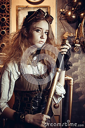 Portrait of a beautiful steampunk woman, with a telescope Stock Photo