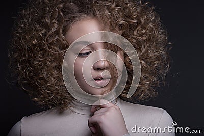 Portrait of a beautiful teenage girl with a creative make-up. Stock Photo