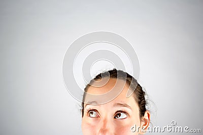 Portrait of a beautiful woman cogitate isolated on a white background Stock Photo