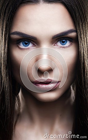 Portrait of beautiful woman with glistening hair Stock Photo