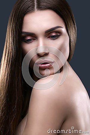 Portrait of beautiful woman with glistening hair Stock Photo